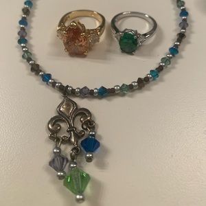 2 rings and a necklace